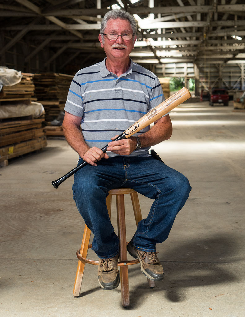 Jim Jungwirth sports a prototype of Mountain Thunder; a tanoak baseball bat which he hopes will be manufactured in Hayfork, CA.